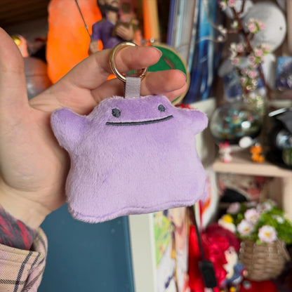 Transforming Blob Bag Charm